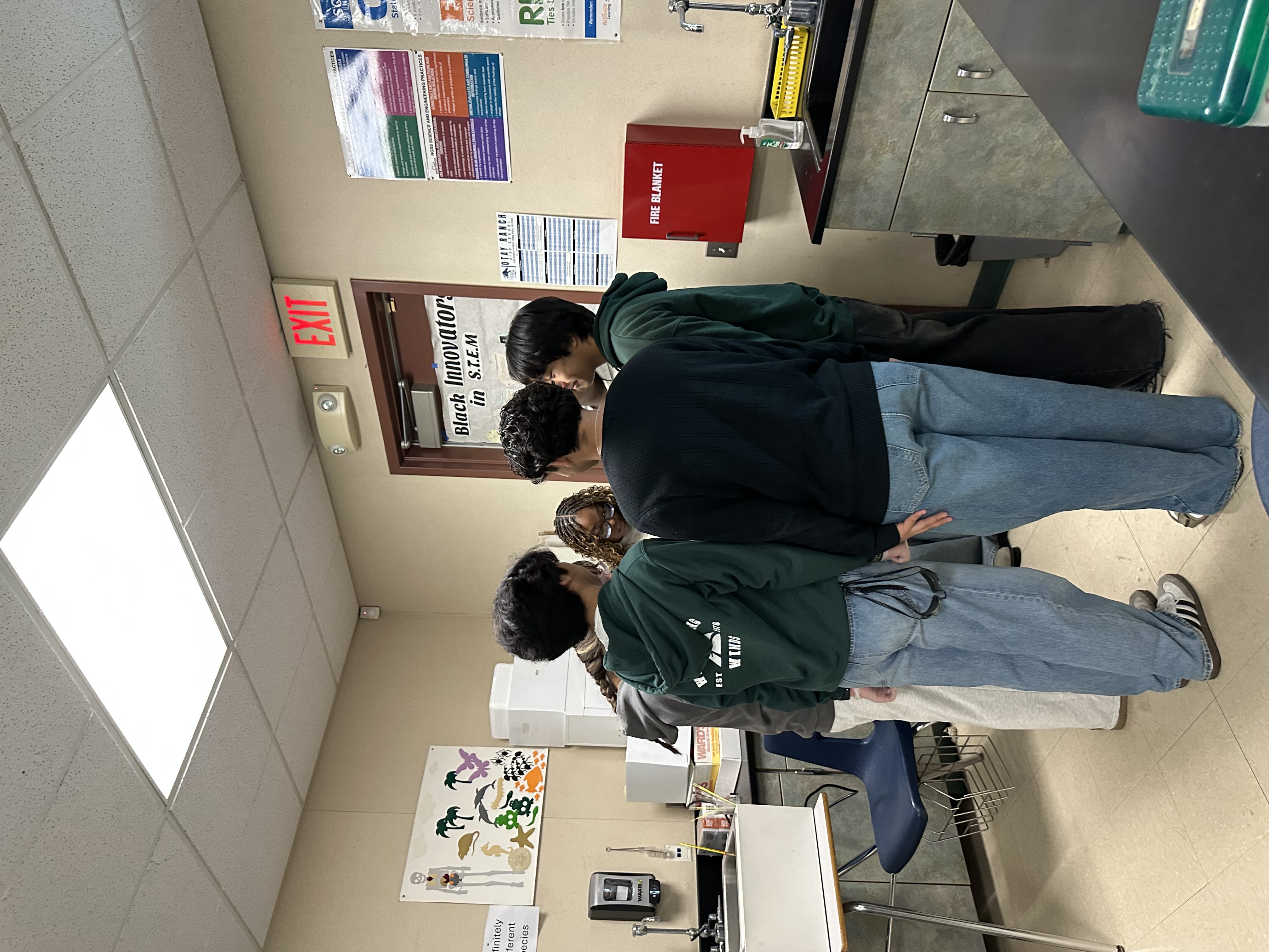 students forming a tight circle - the cell is on ice