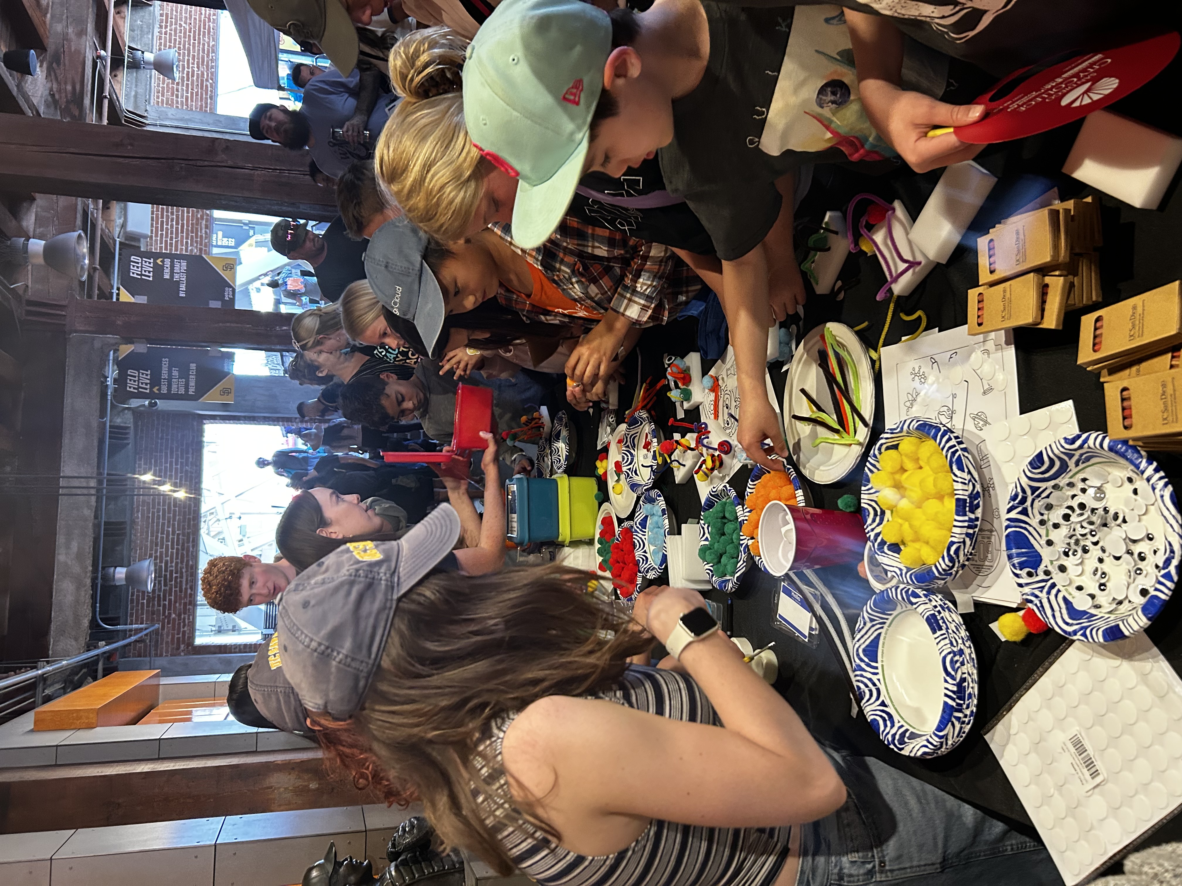 Sarah in the back running the touching and guessing demo and Noemie in the front helping with the arts and crafts. It got a little chaotic ngl.